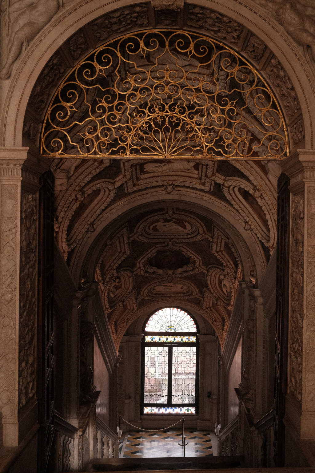 Gilded metalwork above the stairs leading to the 2nd floor of the Doge's palace