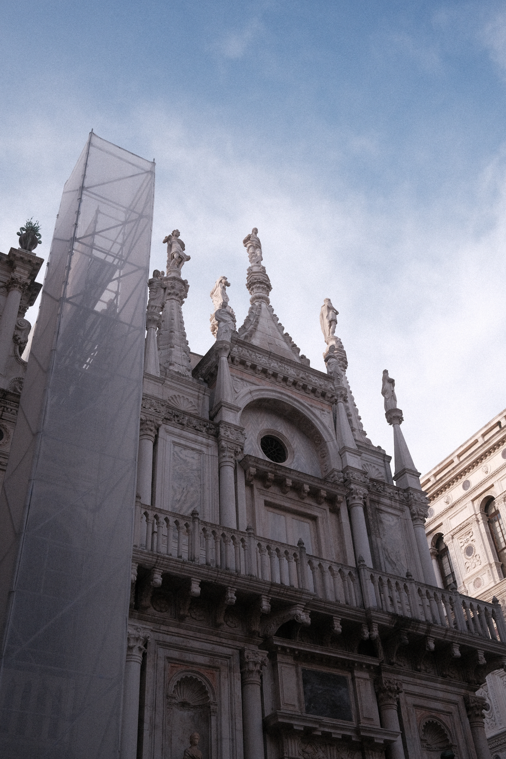 Statues depicting the values of Venice, seen from within the courtyard of the Doge's palace