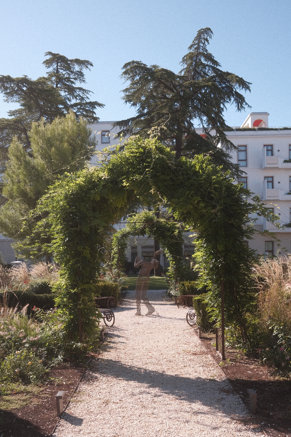 Verdant arches in a garden of Isola delle Rose