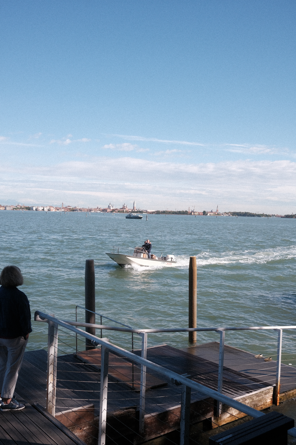 Private boat pulling up to the docks of the JW