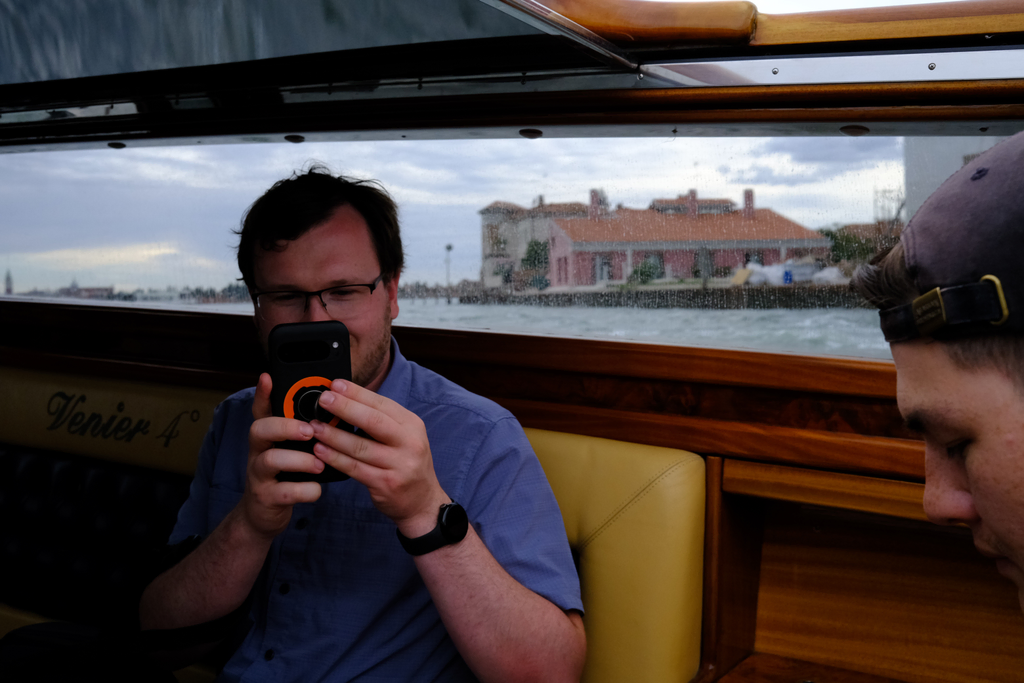 Nick taking a picture of me on the boat back from the glass factory