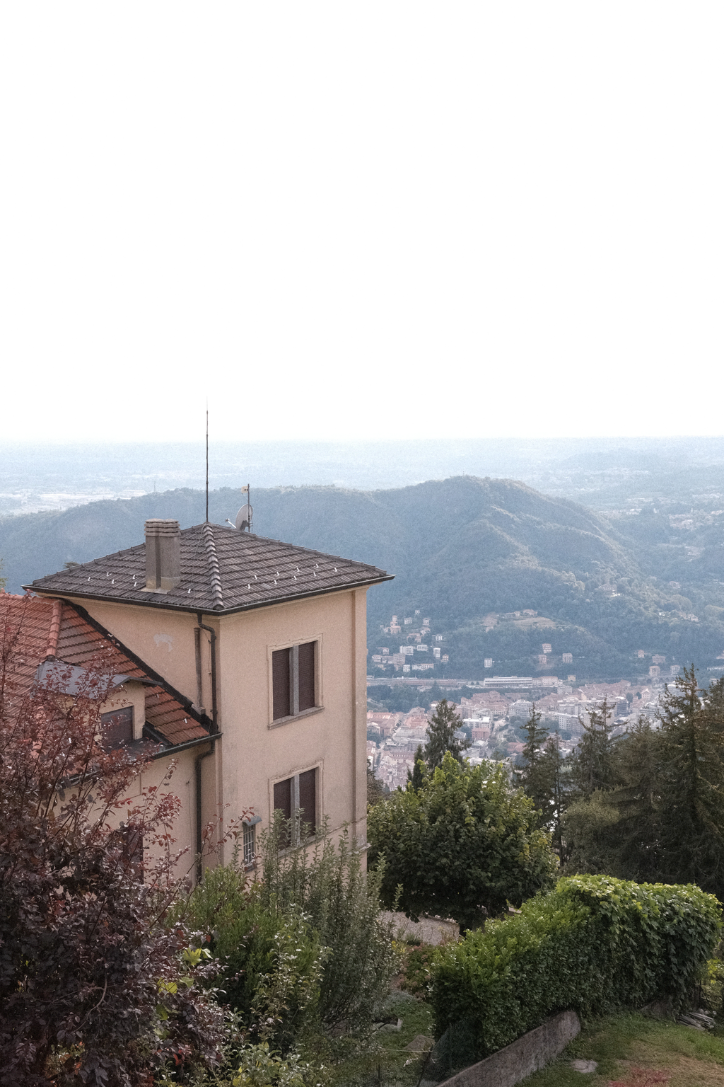 A home perched on the side of the hill