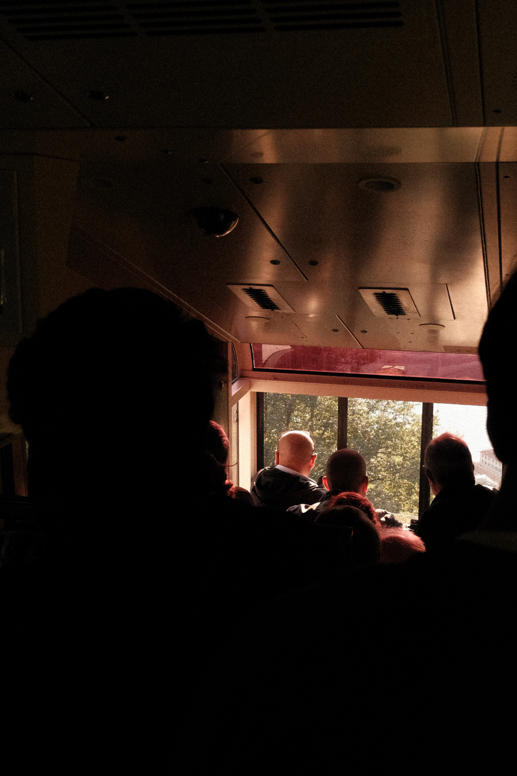 Men watching the funicular's route back down from Brunate