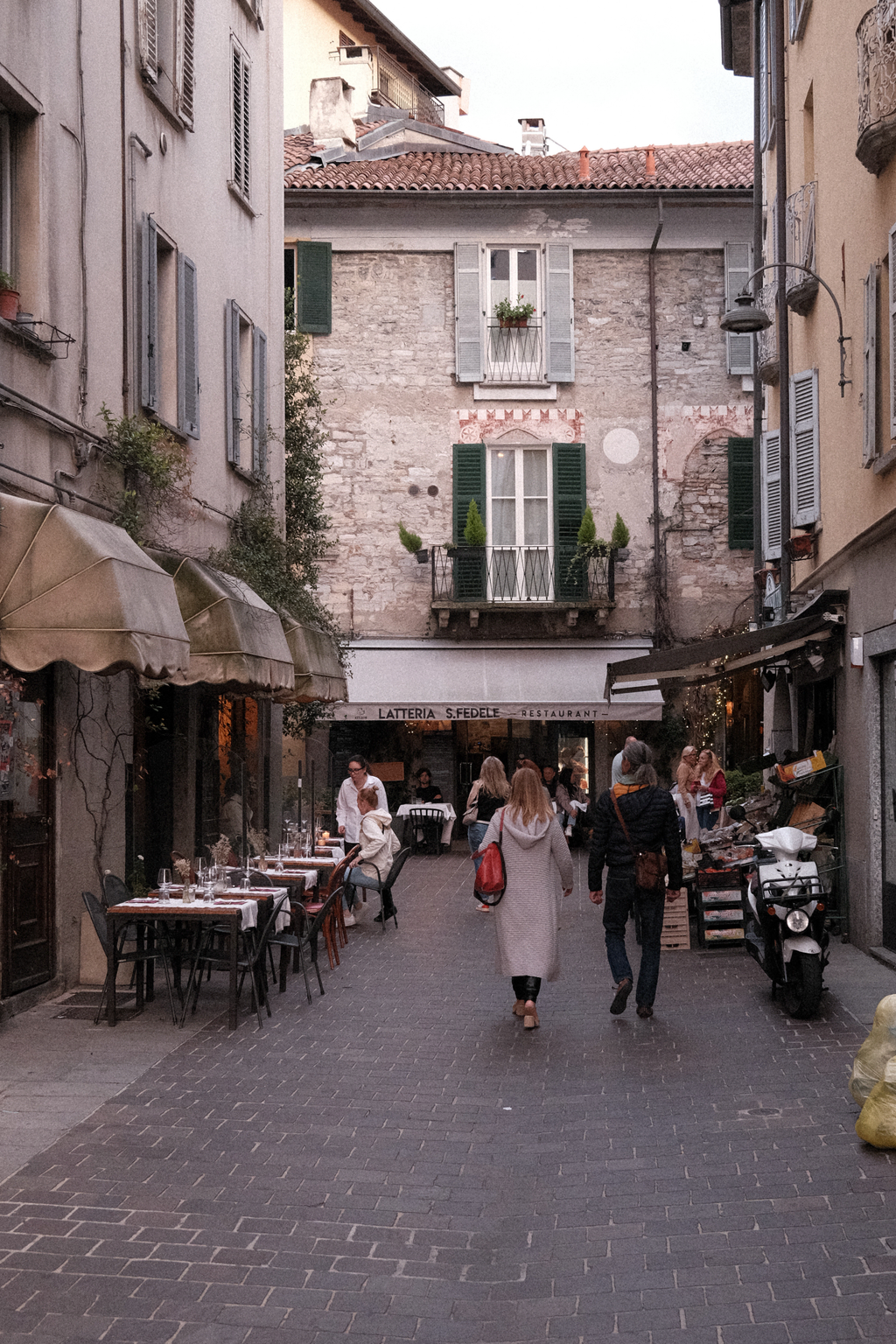 Street next to our AirBNB lined with grocers, cafes, and restaurants