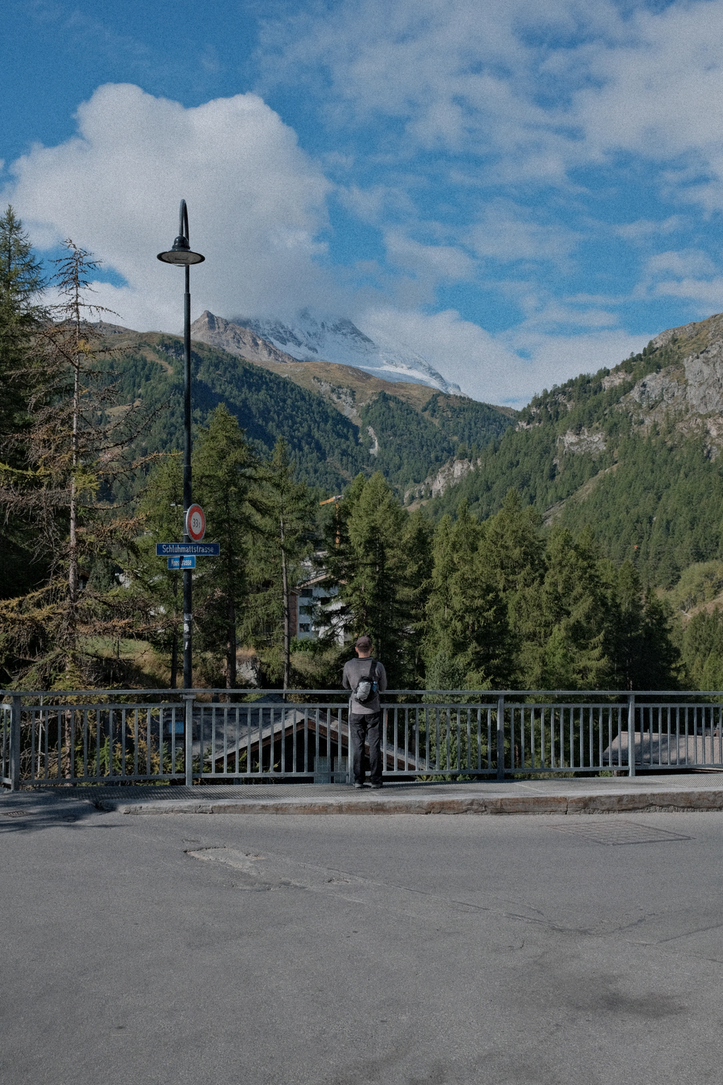 Tim taking a picture on the bridge above our AirBNB