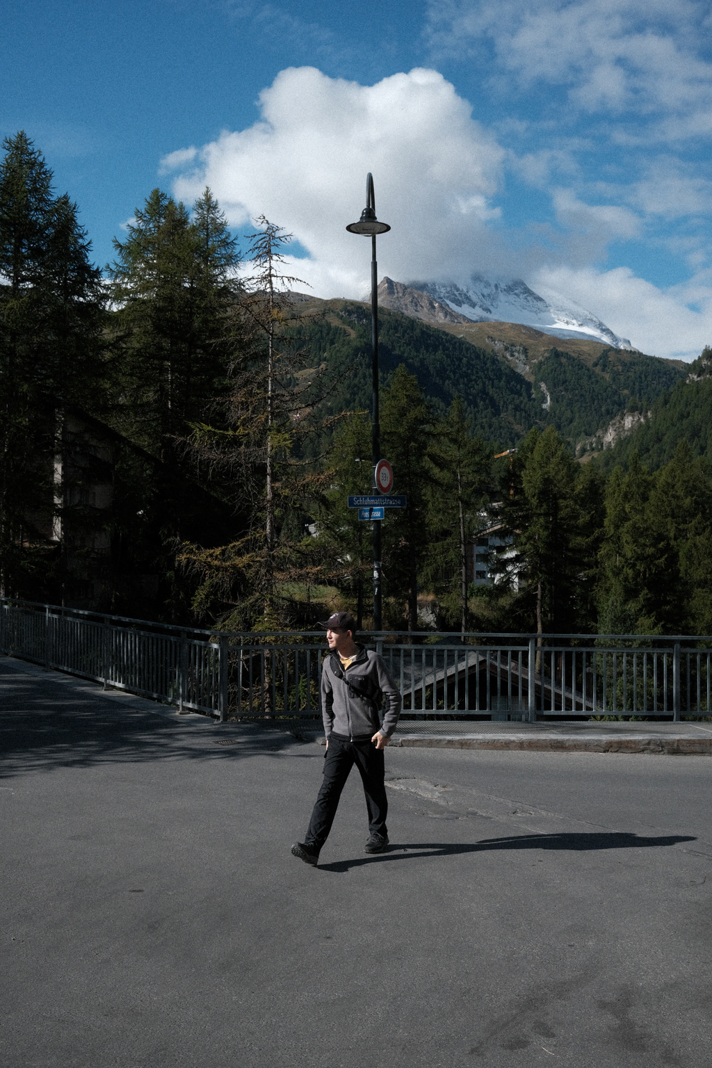 Tim walking to the bus stop near the AirBNB