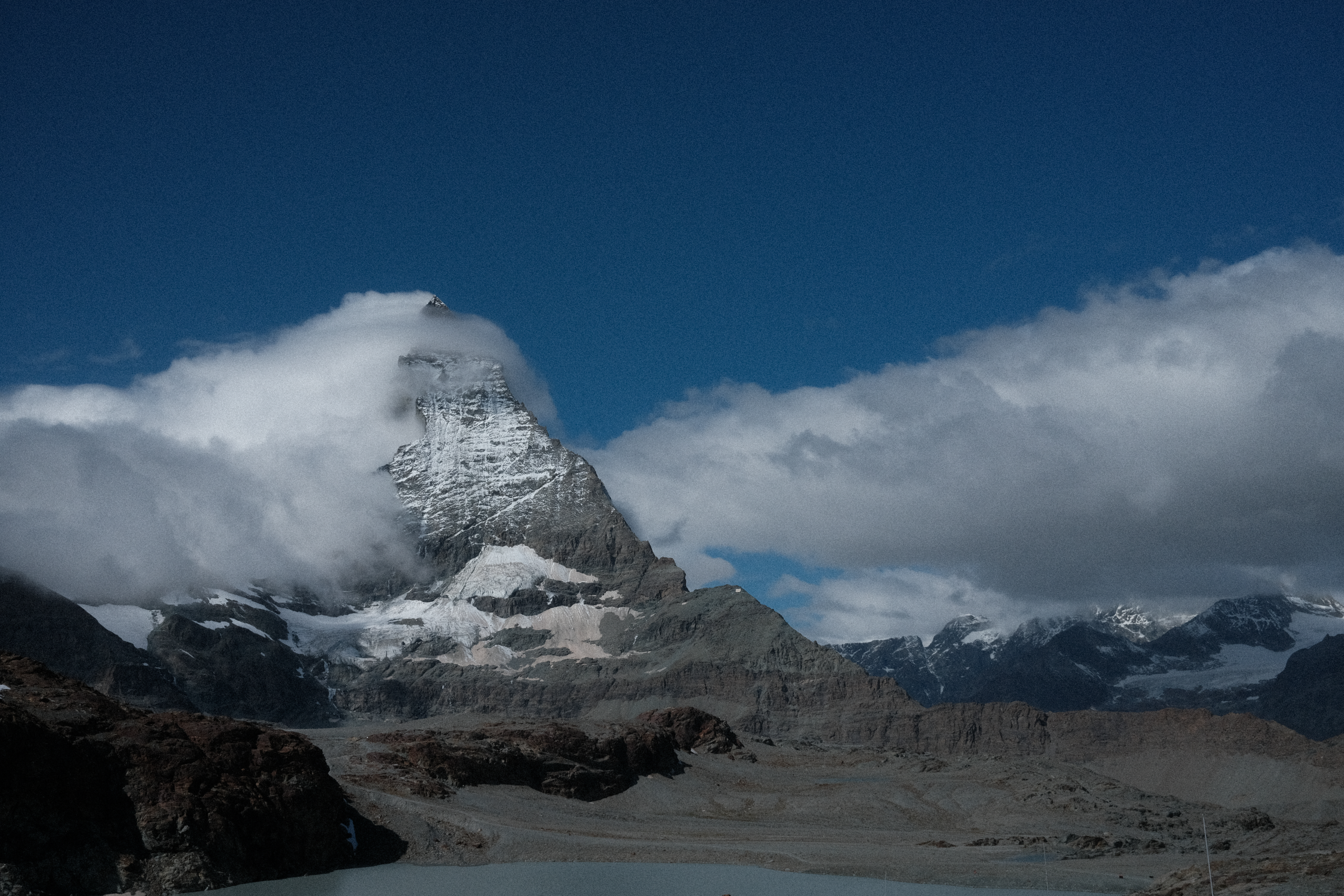 The Matterhorn shedding a layer of clouds near its peak