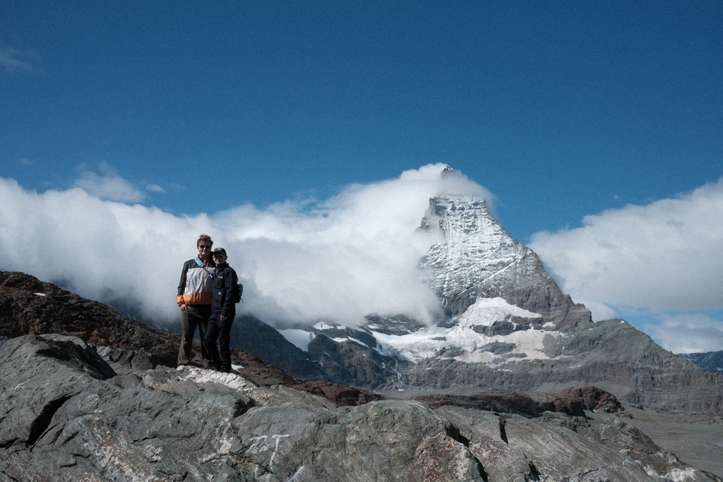 Sean & Tim on a rocky outcrop in front of the Matterhorn