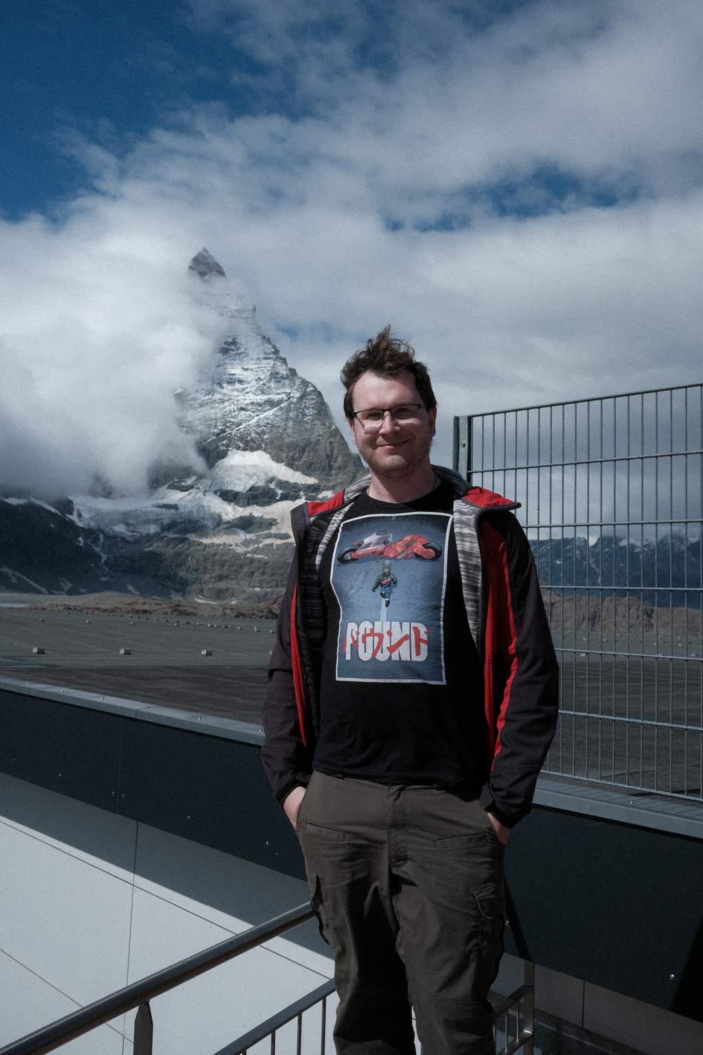 Nick on the viewing balcony of Trockener Steg with the Matterhorn in the background