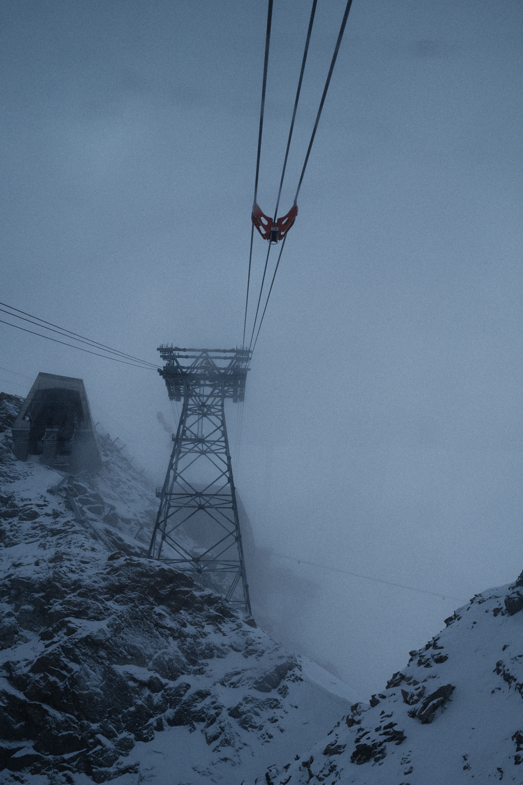 The gondola line up to Zermatt Glacier Paradise, hidden in the fog