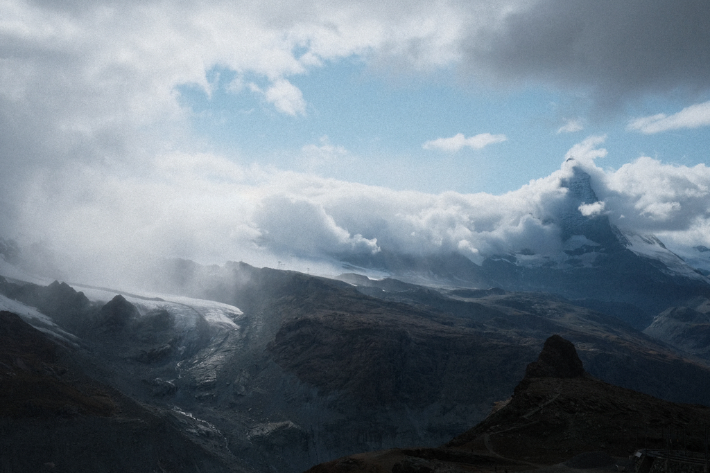 A snow storm cascading over the ridge of the Zermatt valley, threatening to obscrue the Matterhorn