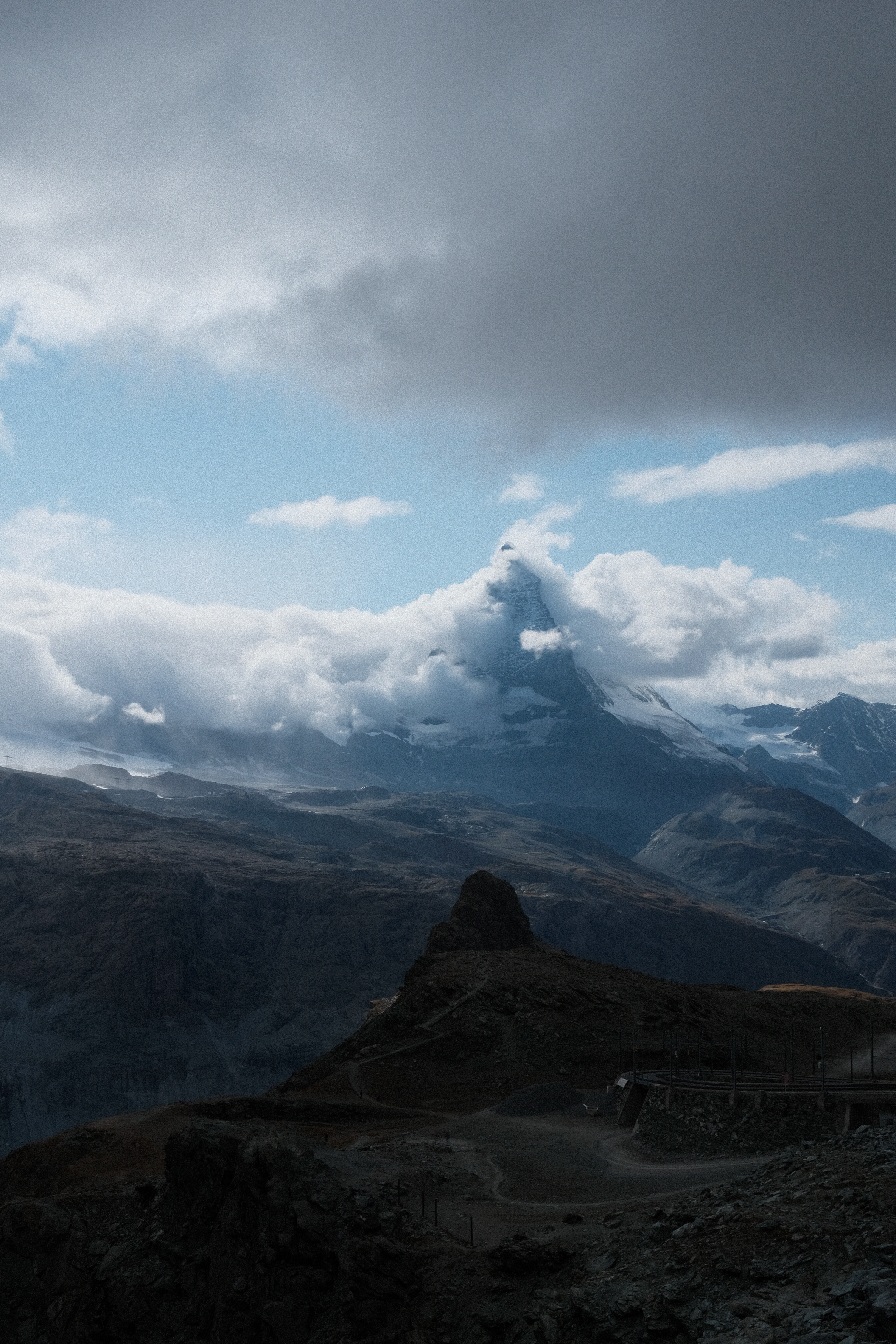 A snow storm cascading over the ridge of the Zermatt valley, threatening to obscrue the Matterhorn