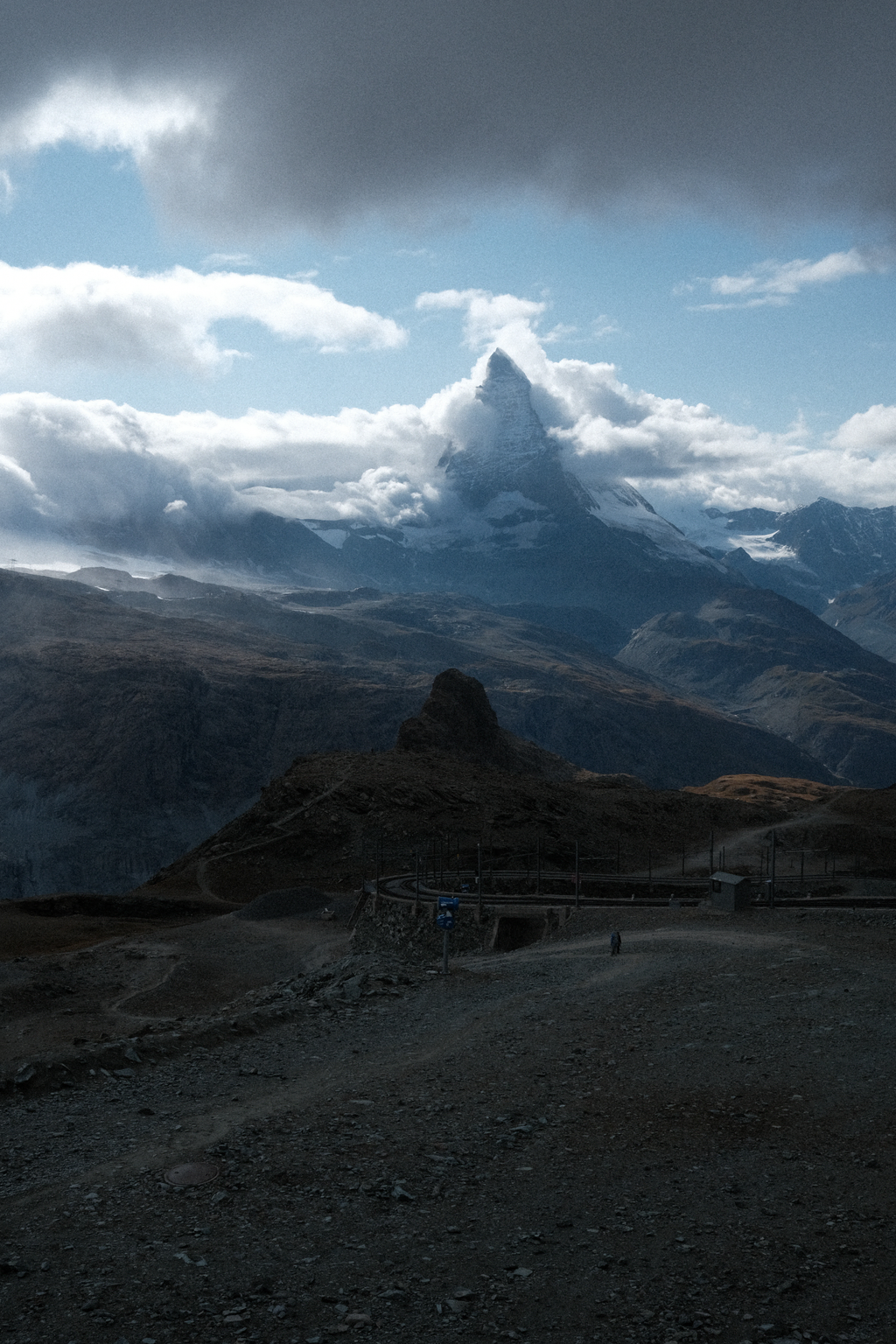 A storm encroaching on the Matterhorn in the late afternoon sun