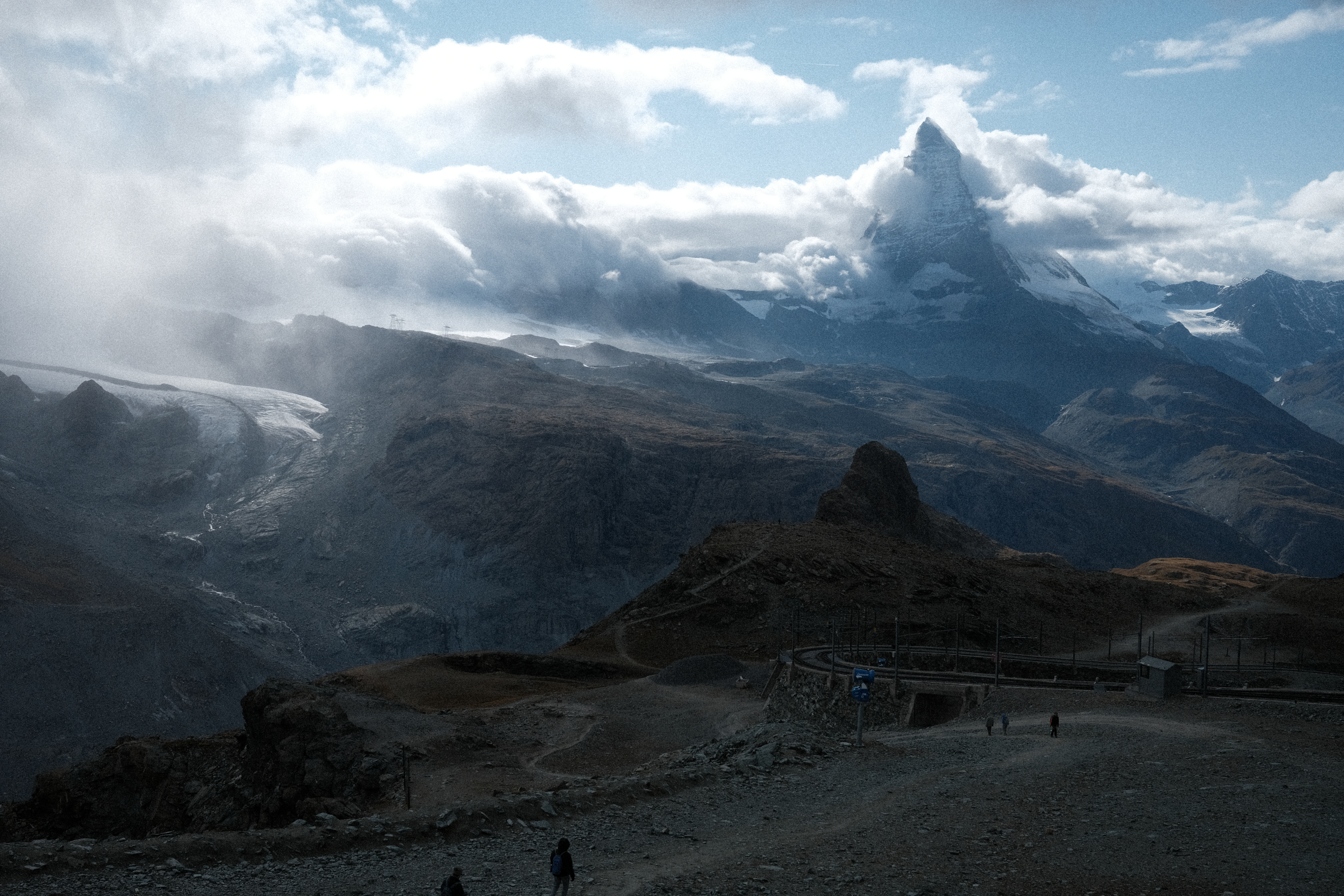 A storm encroaching on the Matterhorn in the late afternoon sun