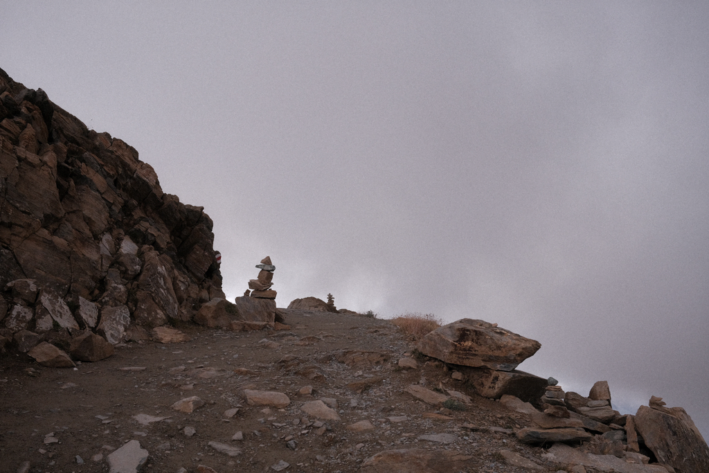 Several cairns marking the route between Gornergrat and Hohtälli peak