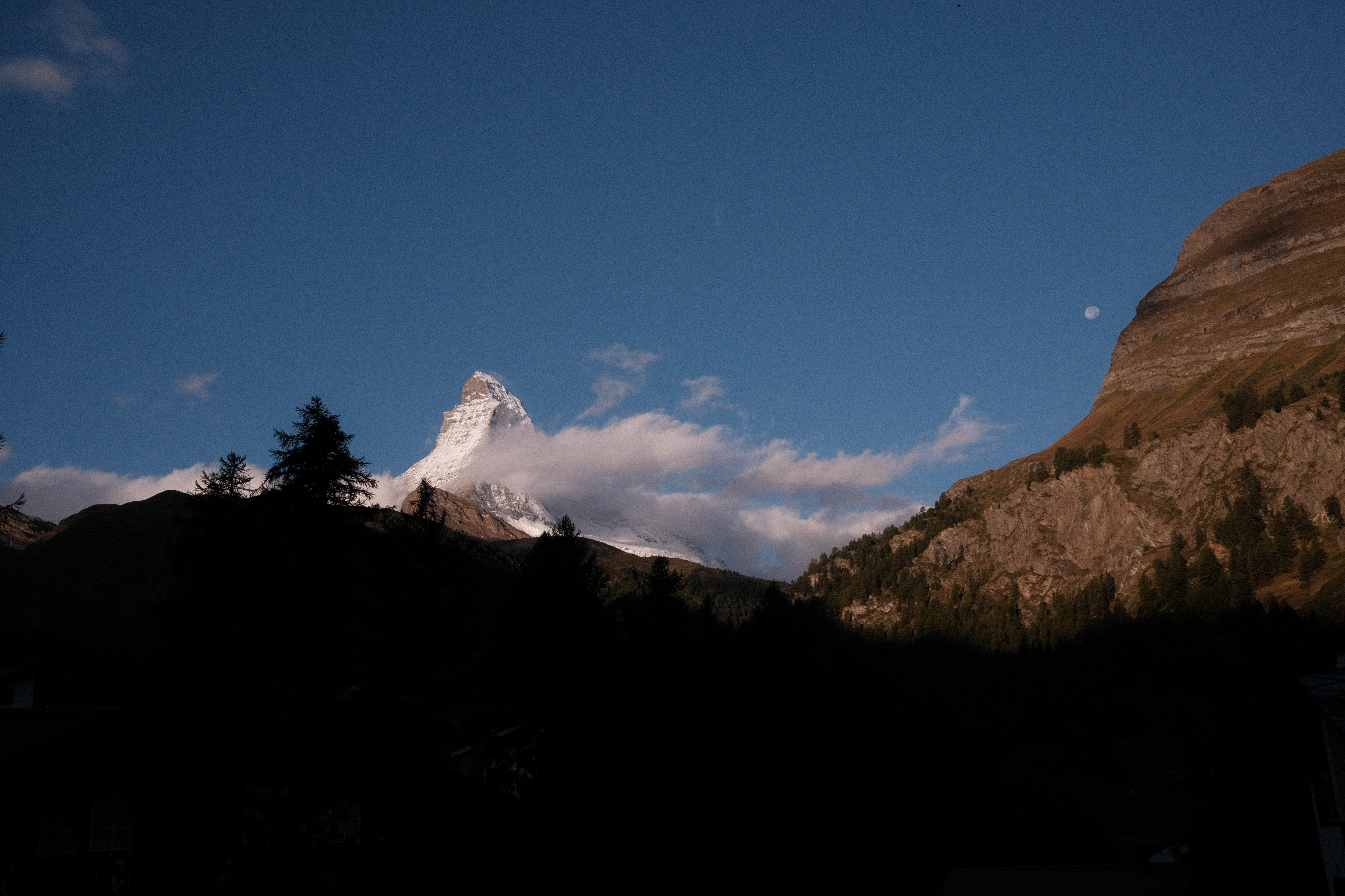 The Matterhorn with early morning light and the moon