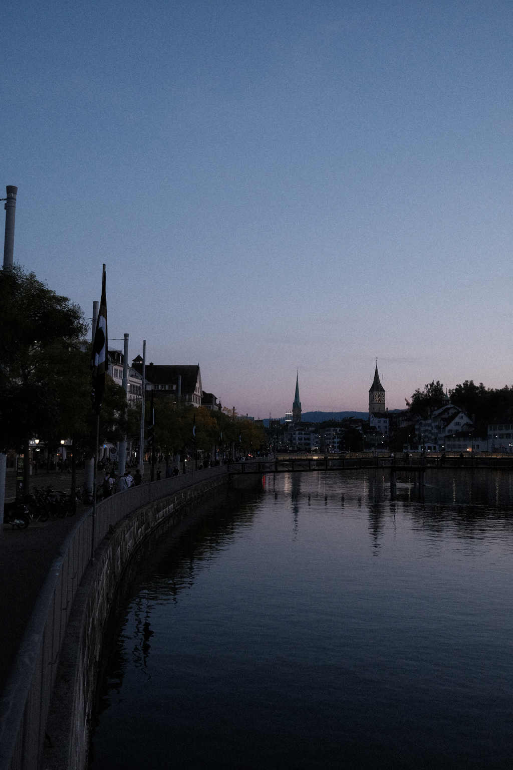 Looking down the Limmat and Limmatquai at dusk