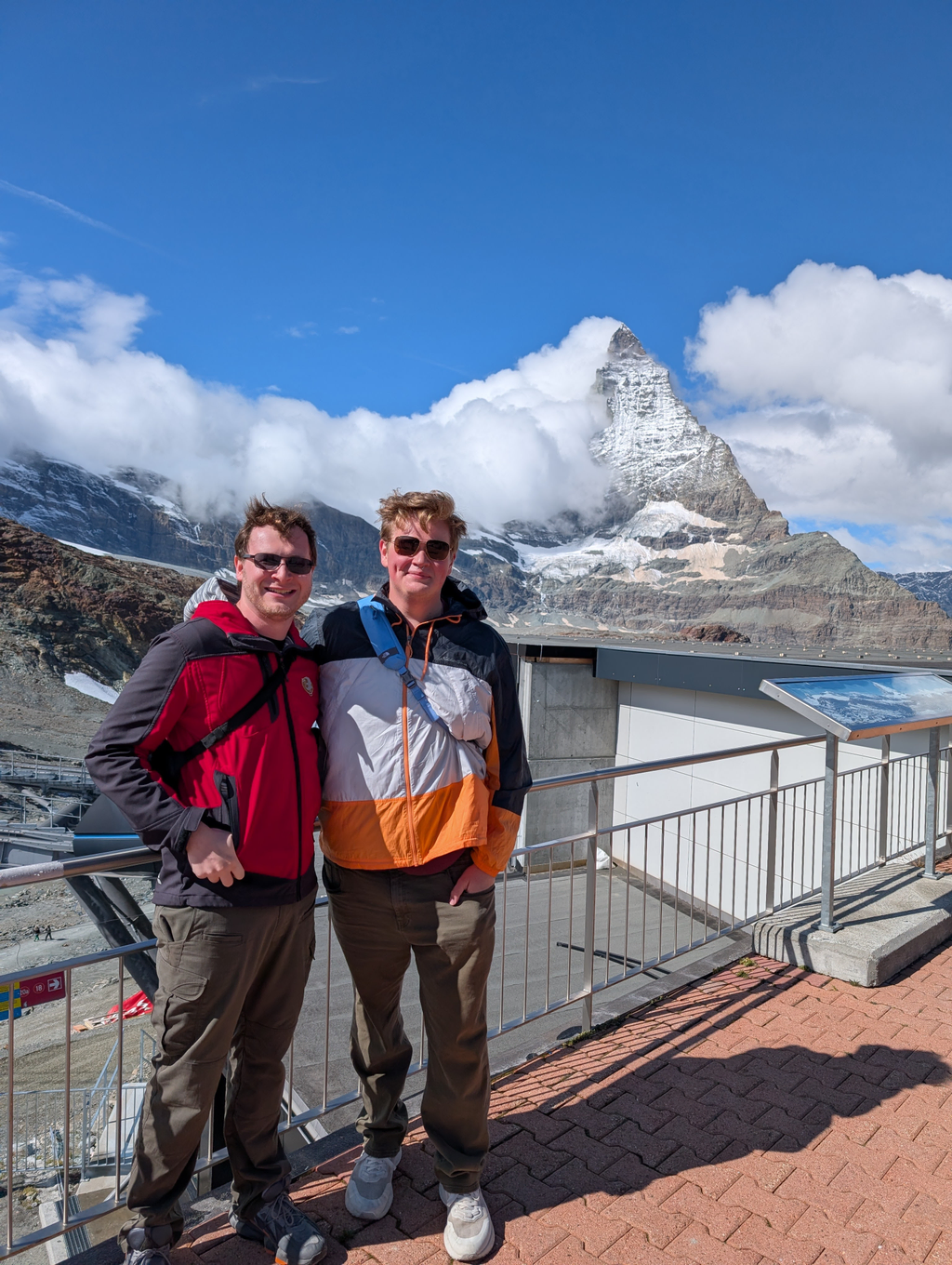 Nick & Sean on the viewing balcony of Trockener Steg with the Matterhorn in the background