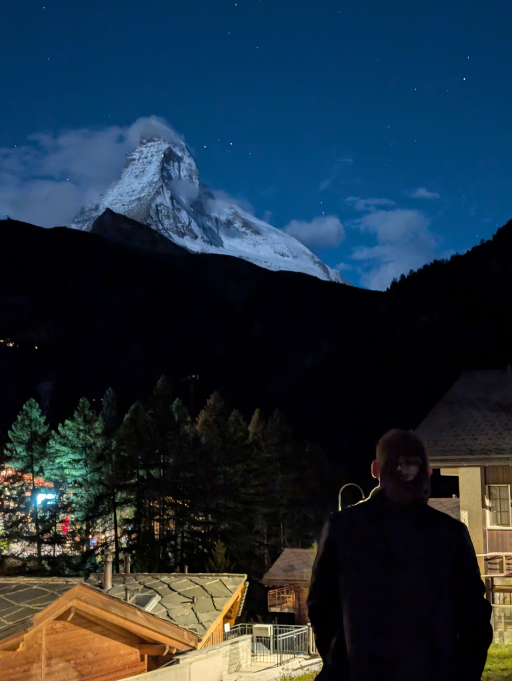 Tim looking up at the Matterhorn at night