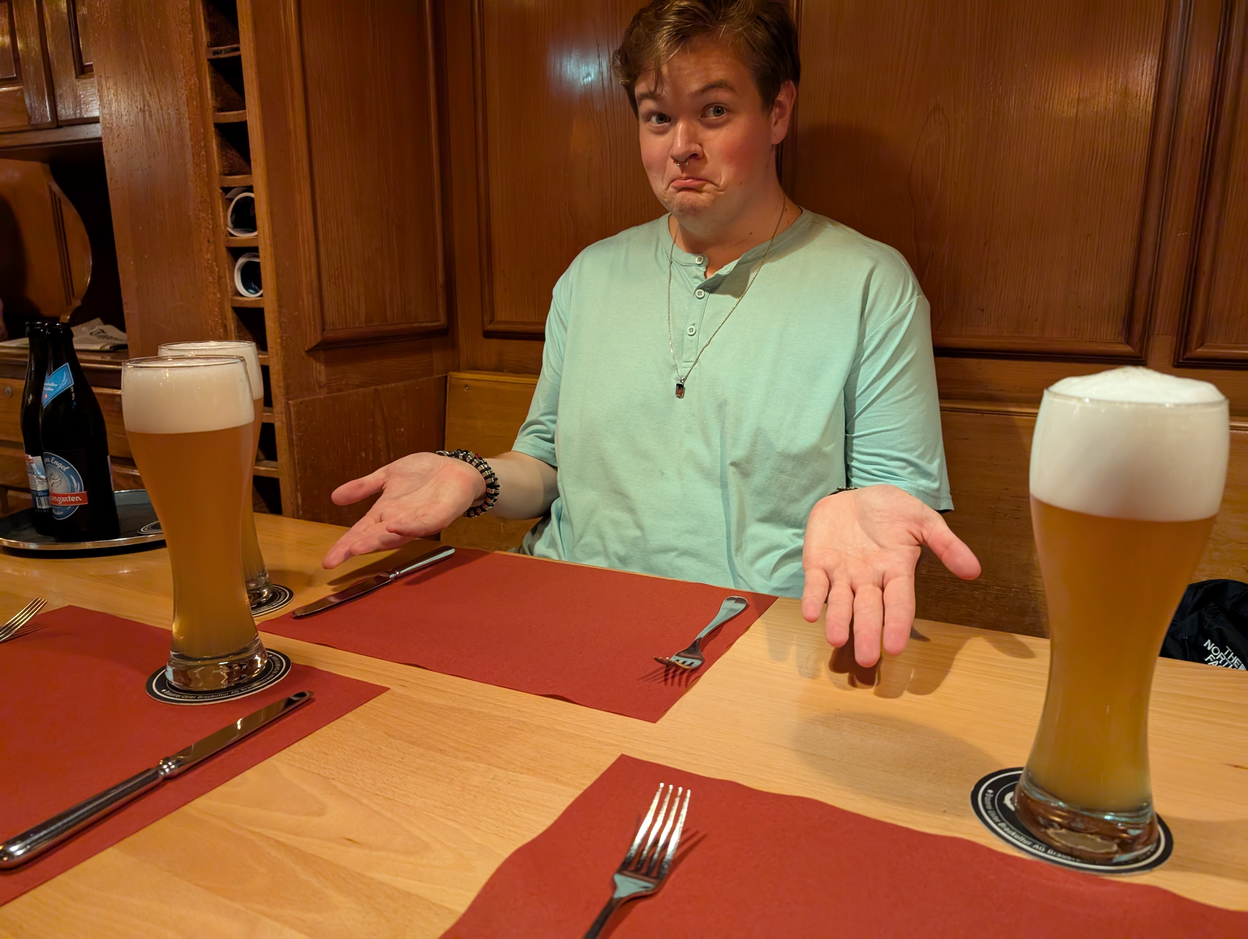 Sean preseting the Weissbier we all ordered at dinner