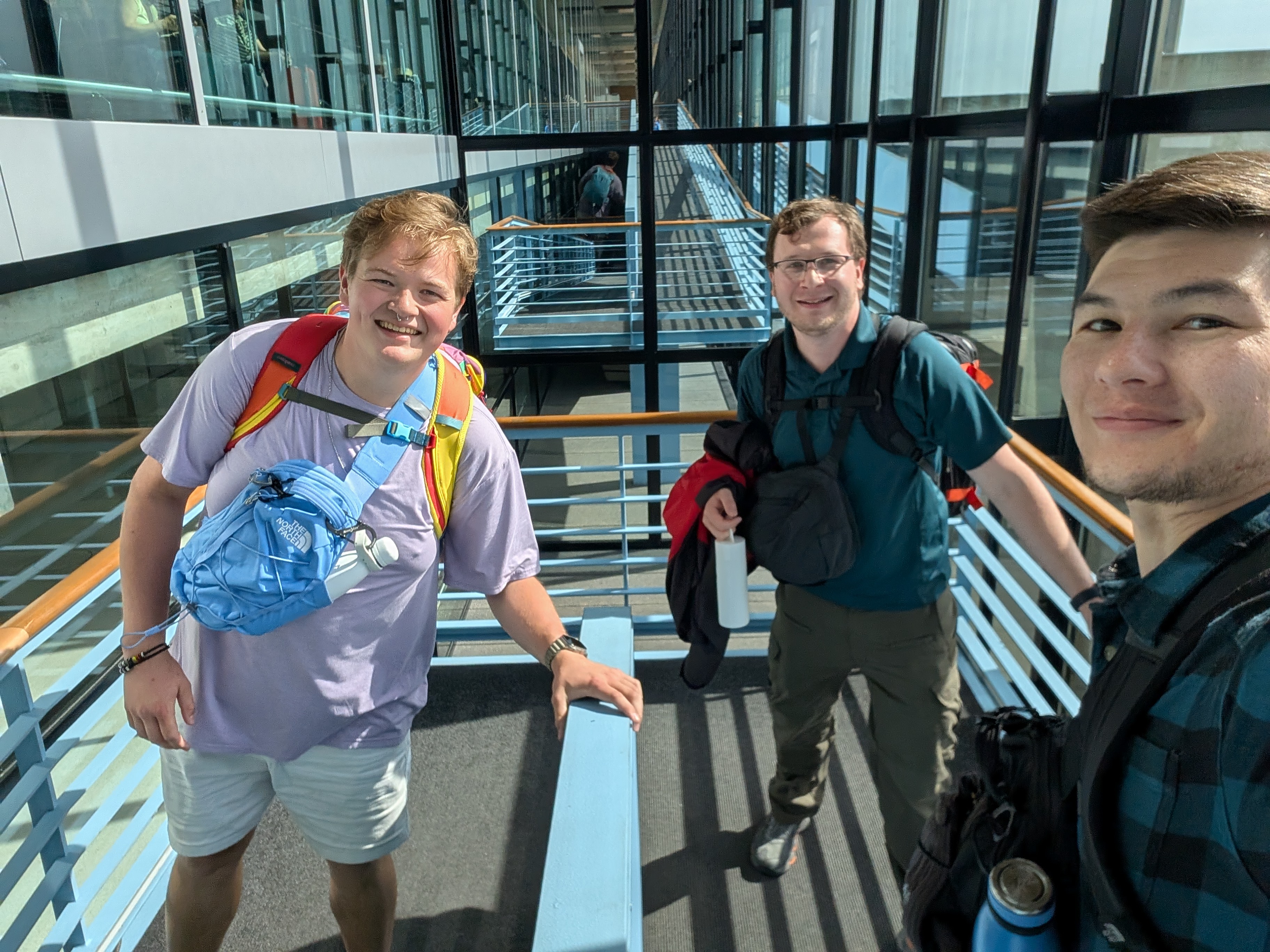 Group selfie on the jet bridge before boarding our flight to the US